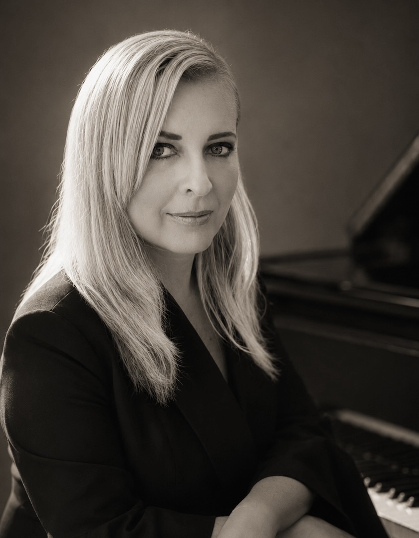 Tanya Schweiger, piano teacher in Rancho Santa Margarita, CA, at the piano